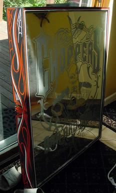 Backlit mirror pinstriped cabinet